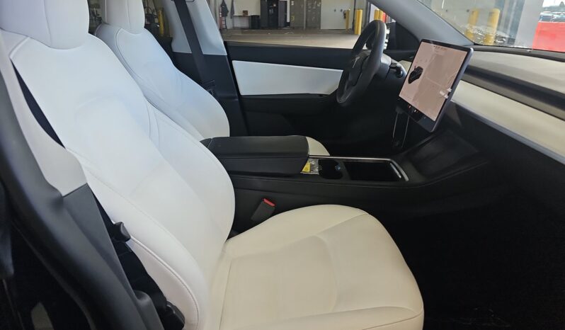
								Tesla Model Y Long Range full									